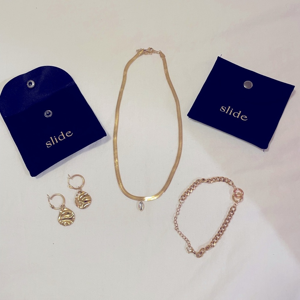 Gold necklace, bracelet and earrings by Slide Honey